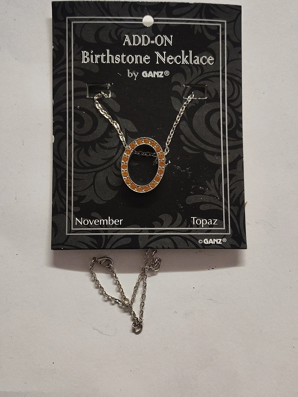 GANZ Silver Necklace with Orange Topaz Circle Pendant